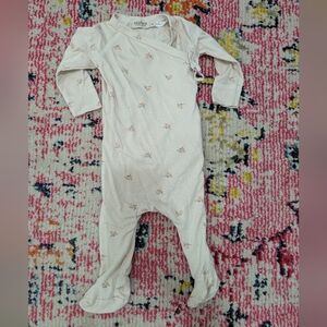 Cream Footed Baby One Piece with Floral Accents